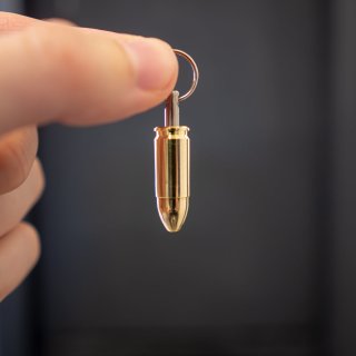 9mm Patrone als Anhänger mit Vollmantel Geschoss